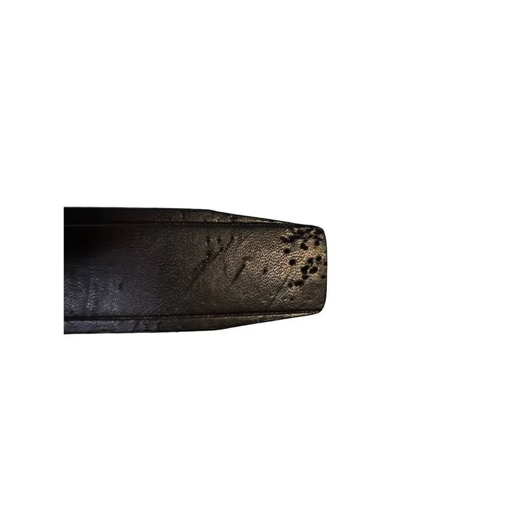 Nike Golf black belt, with silver buckle. Size 34.